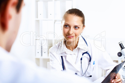 Friendly doctor in medical office