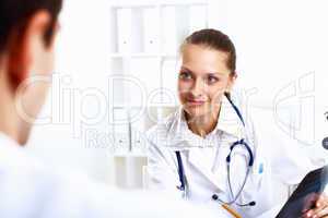 Friendly doctor in medical office