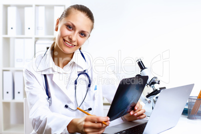 Friendly doctor in medical office