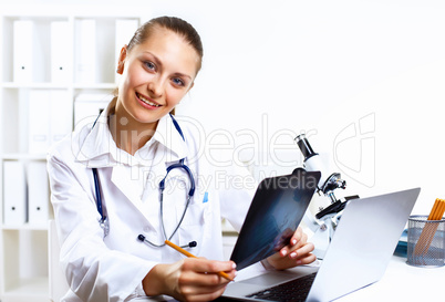 Friendly doctor in medical office