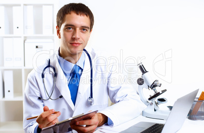 Friendly doctor in medical office