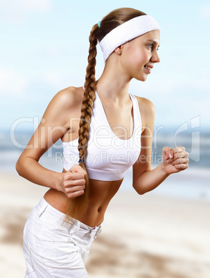 Young pretty woman in sport wear