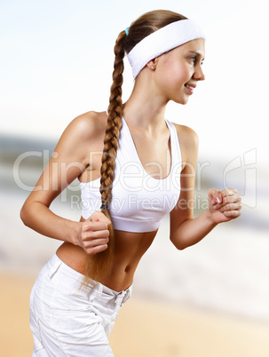 Young pretty woman in sport wear