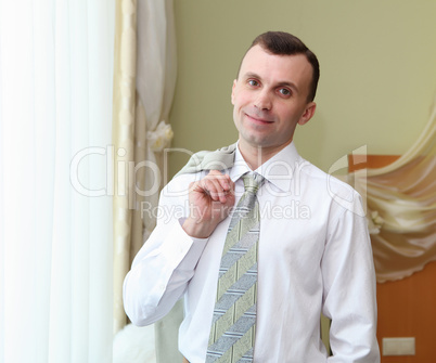 young businessman in hotel room