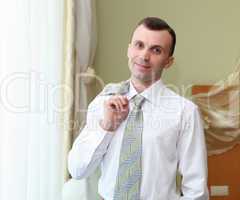 young businessman in hotel room