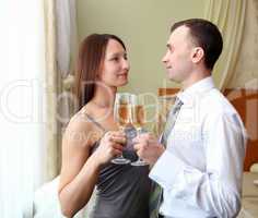 young  couple with glasses of champagne