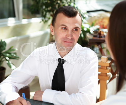 young businessman in the garden