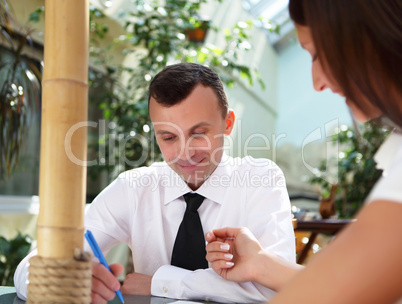 young businessman in the garden