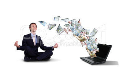 Young businessman with many banknotes