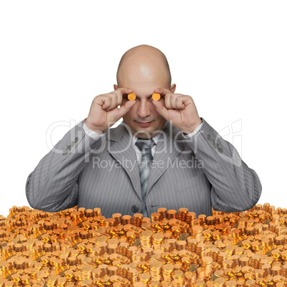 Bald young businessman with a small coin