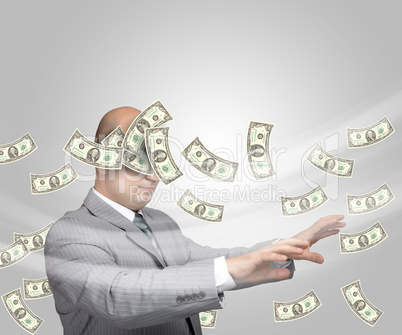 Bald young businessman with banknotes