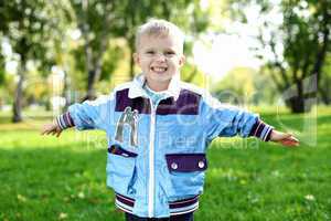 Little boy in summer park