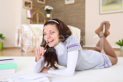 young girl at home with books