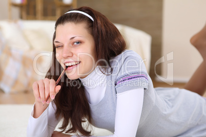 young girl at home with books