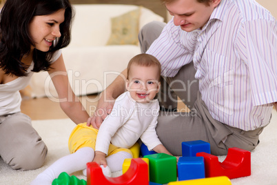 baby with a mother at home