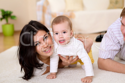 baby with a mother at home