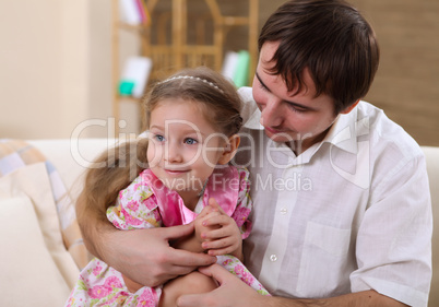 father with a daughter at homes