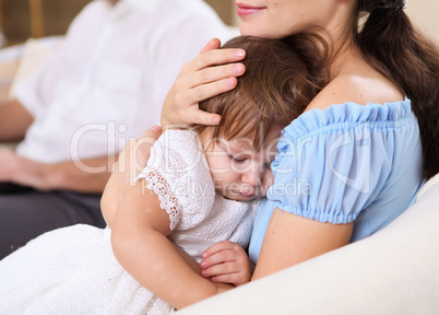 baby with a mother at home