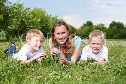 mother with her two sons outdoors
