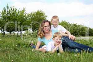 mother with her two sons outdoors