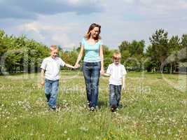 mother with her two sons outdoors