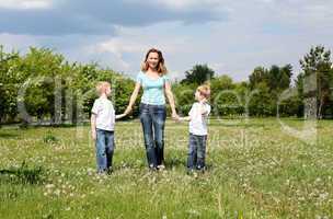 mother with her two sons outdoors