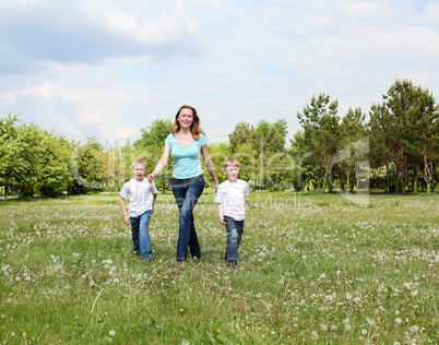 mother with her two sons outdoors