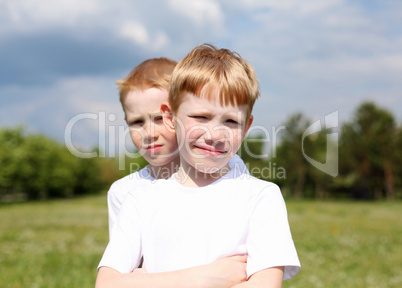 two brothers outdoors