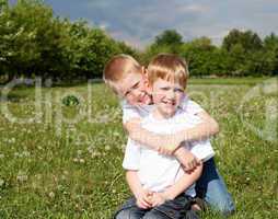 two brothers outdoors