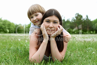 itlle girl with her mother outdoors