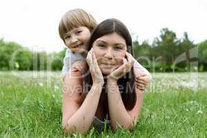 itlle girl with her mother outdoors