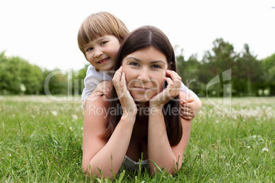 itlle girl with her mother outdoors