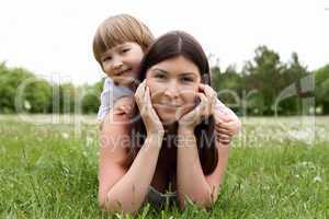 itlle girl with her mother outdoors