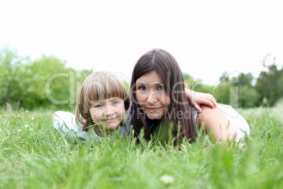 itlle girl with her mother outdoors