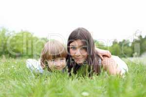 itlle girl with her mother outdoors