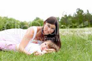 itlle girl with her mother outdoors