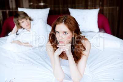 couple in disagreement in bedroom
