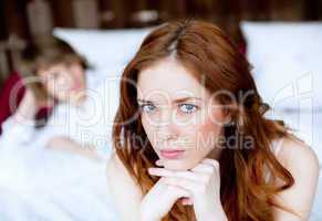 couple in disagreement in bedroom