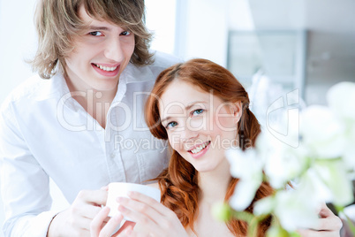 young couple with a gift