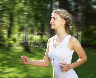 Young girl in a white shirt and red pants