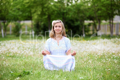 Young blond woman in the park