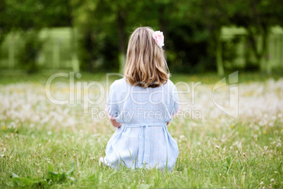 Young blond woman in the park