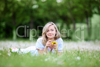 Young blond woman in the park