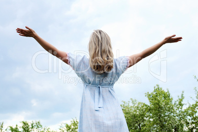 Young blond woman in the park