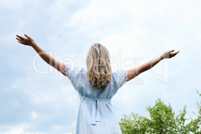 Young blond woman in the park