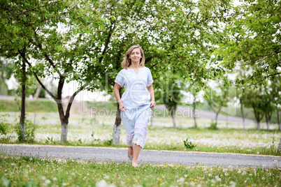 Young blond woman in the park