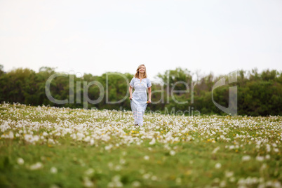 Young blond woman in the park