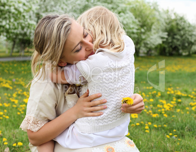 girl with mother in the park