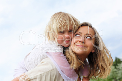 girl with mother in the park