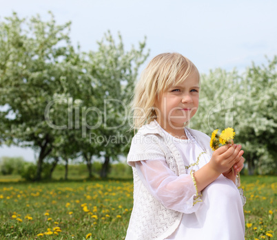 little girl in spring park little girl in spring park